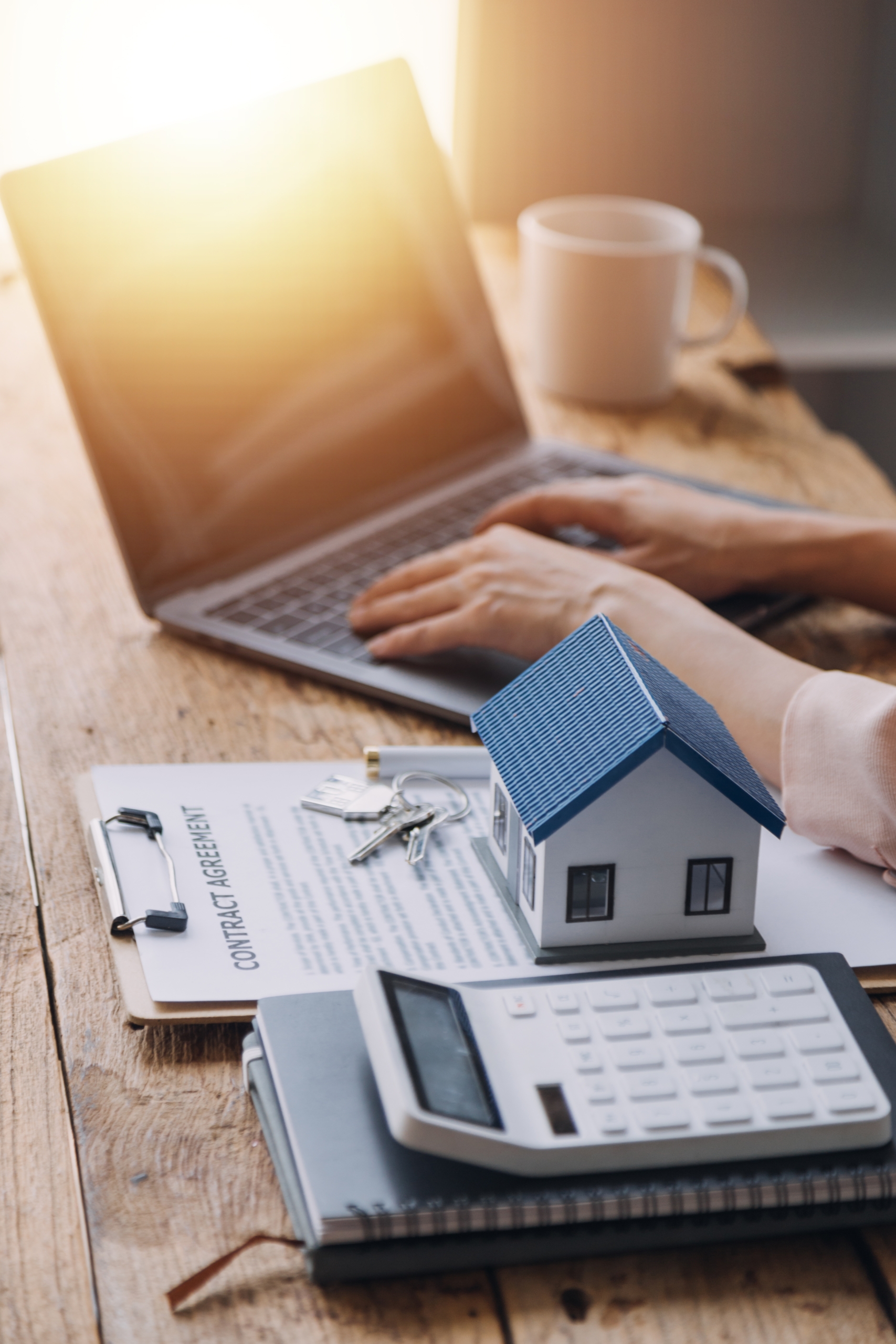 Real estate broker agent presenting and consult to customer to decision making sign insurance form agreement, buy and sell home model, concerning mortgage loan offer for and house insurance